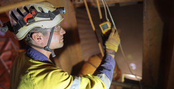 Trautman technician working on a mechanical construction project